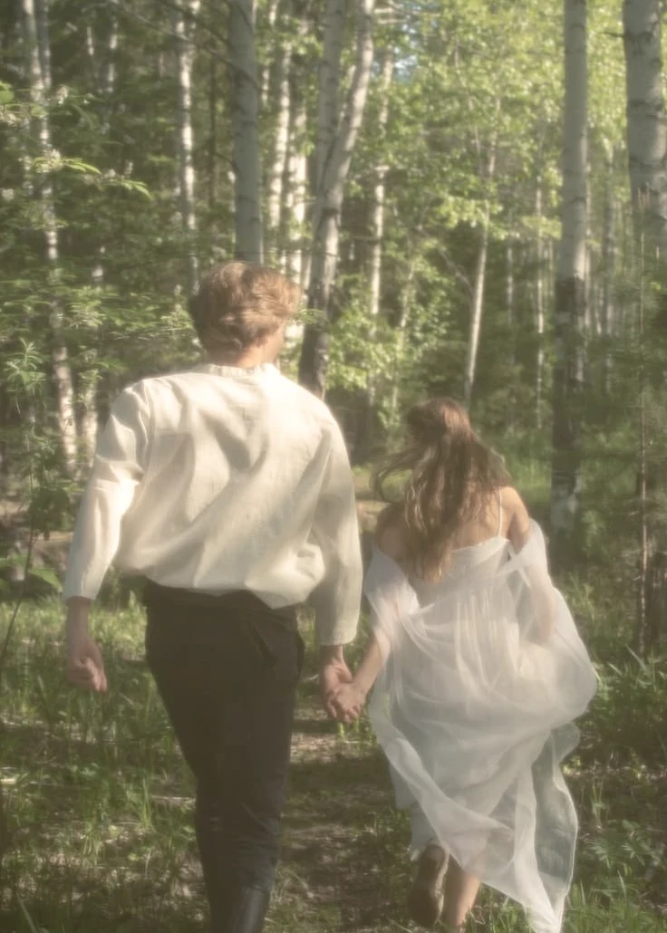 Sylvia and Romeo walking in the woods